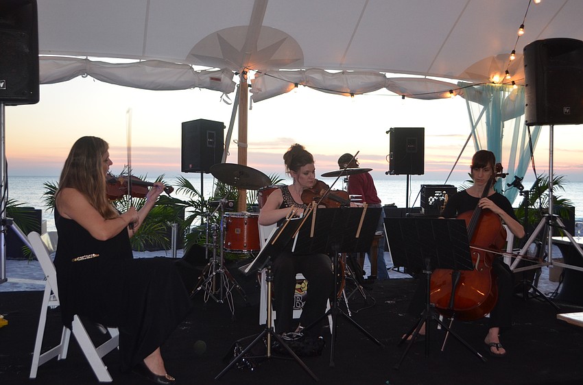 Margo Zarzycka, Shawna Trost and Nadine Trudel performed during the sixth annual Bacchus on the Beach on Nov. 11.
