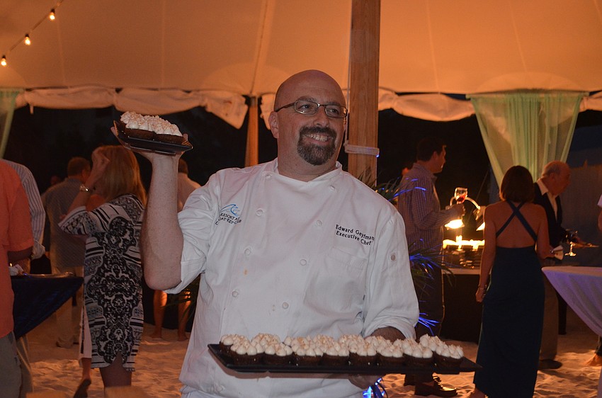 Executive Chef of the Longboat Key Club, Ed Geyfman, brings out cupcakes during the sixth annual Bacchus on the Beach.