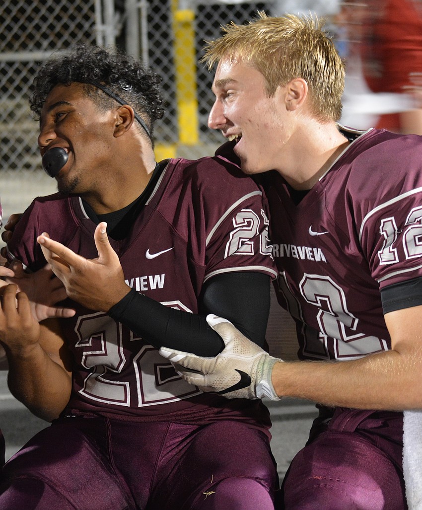 Riverview sophomore running back Ali Boyce and senior quarterback Mike Welcer turned to their humorous sides after Riverview built a 49-point halftime lead against Olympia. The Rams went on to win 56-25.