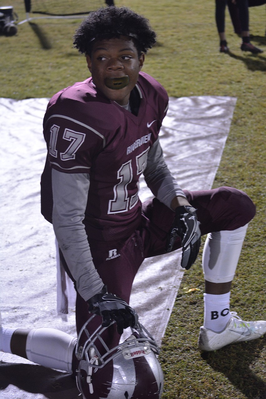 Riverview freshman wide receiver Samari Smith waits for instruction on when to get back in the game. The Rams beat Olympia 56-25.