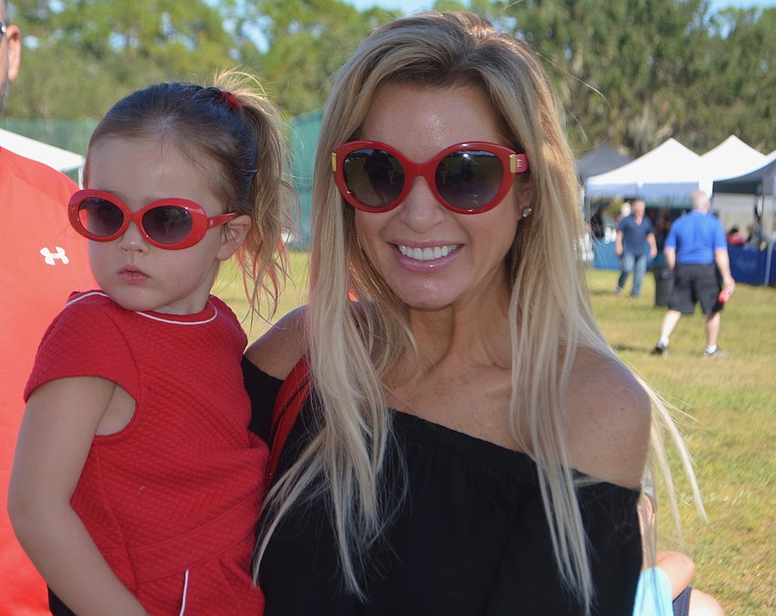 Lakewood Ranch's Ella Van Vliet, 2, and her mother, Kelly Van Vliet, rock some matching sunglasses.