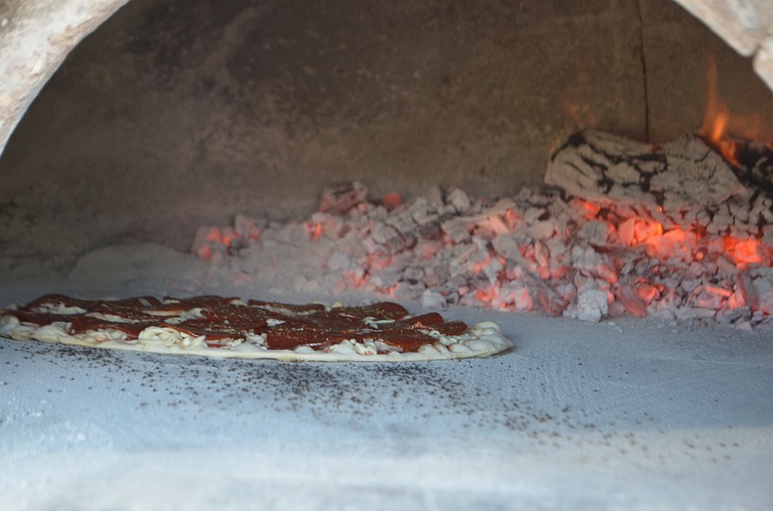 The cooks at Goodfella's Cafe and Winery brought their brick oven with them.