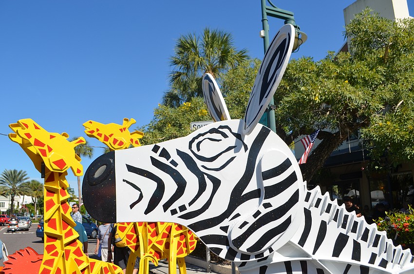 Giraffe and Zebra kinetic sculptures by Fredrick Prescott were on display during the St. Armands Art Festival.