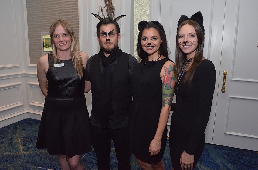 Humane Society of Sarasota County Communications Coordinator Nalani Simpson with Dillon Murray, Ashley Miller and Chelsea Guminski, the “Hot Dogs and Cool Cats” who served cocktails to guests