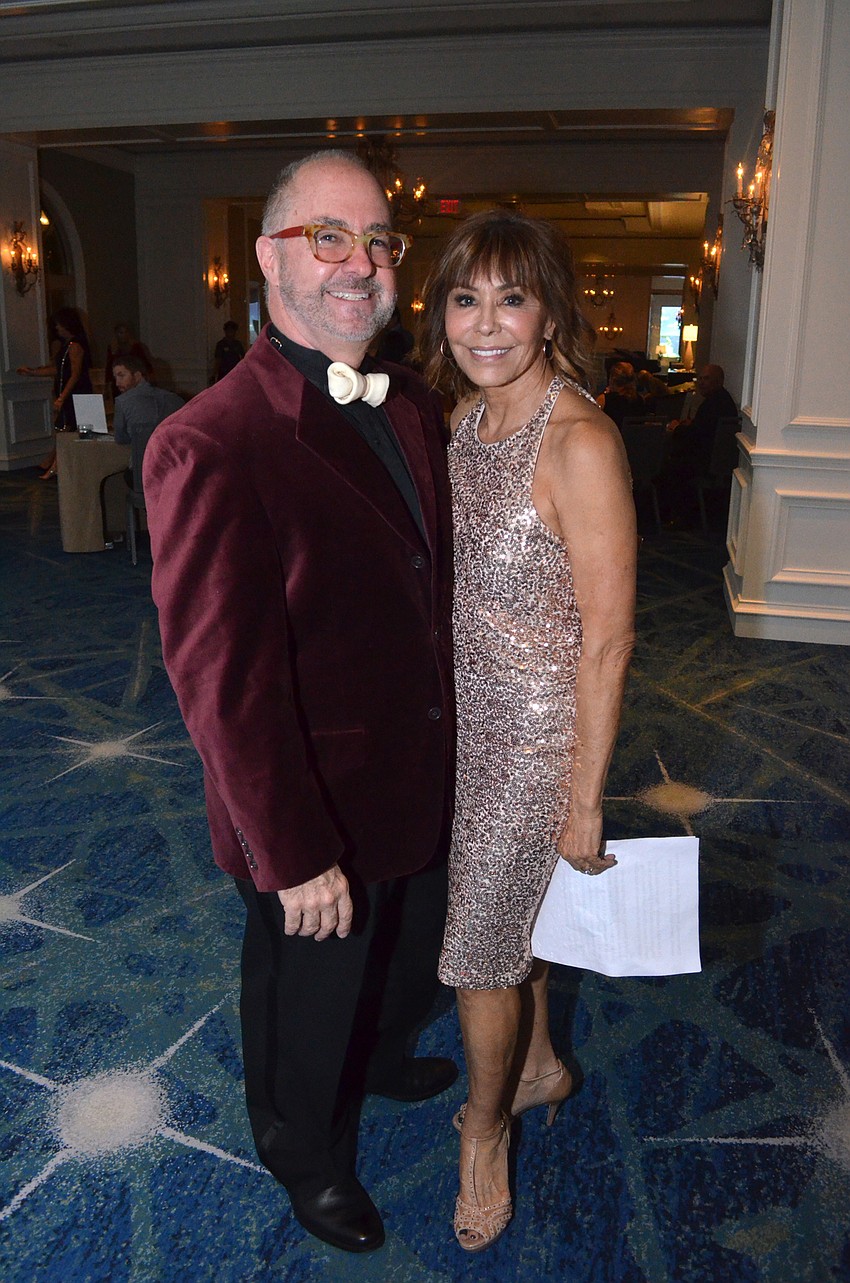 Kirk and Chris Voelker, President of the Board of Directors for the humane society