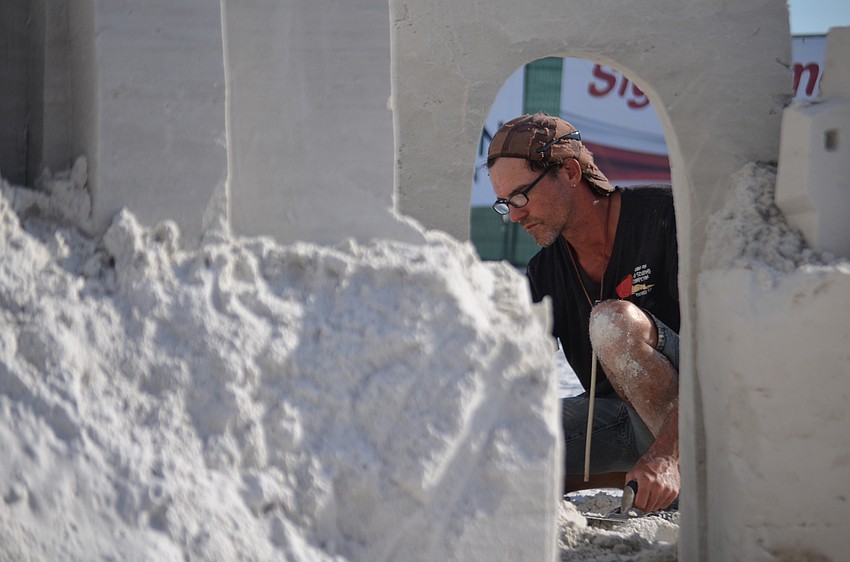 Delayne Corbett works on his teams submission to the festival.