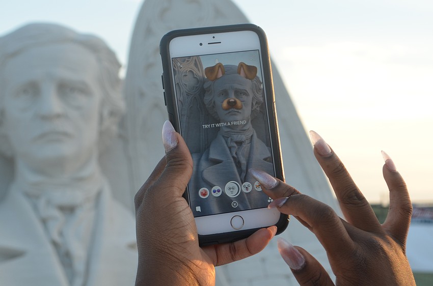 Taylor Battie applies a Snapchat filter to Andrius Petkkus and Dmitry Klimenko's submission entitled 