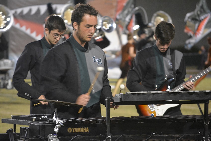 Braden Lord, Michael McAfee and Kevin Mendel entertain the crowd.