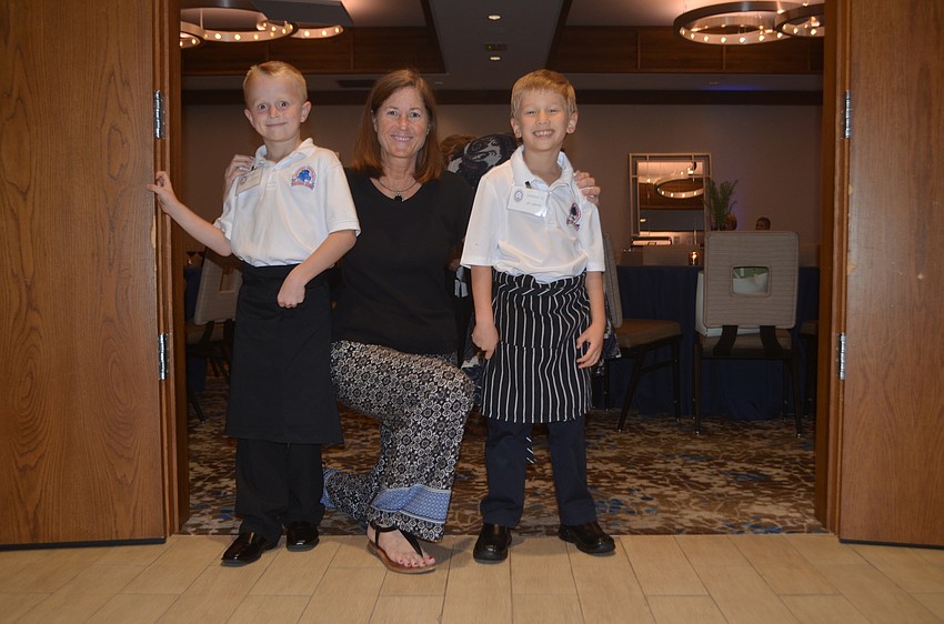 First grade teacher at Southside Elementary Carol West poses with students Owen Boyle (left) and Zachary Kurnov (right).