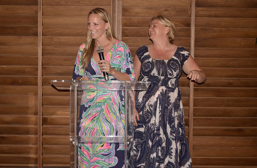 Event co-chairwomen Amie Boyle and Becky Angelo thank Southside Elementary parents and teachers for their time volunteering in the school's garden.