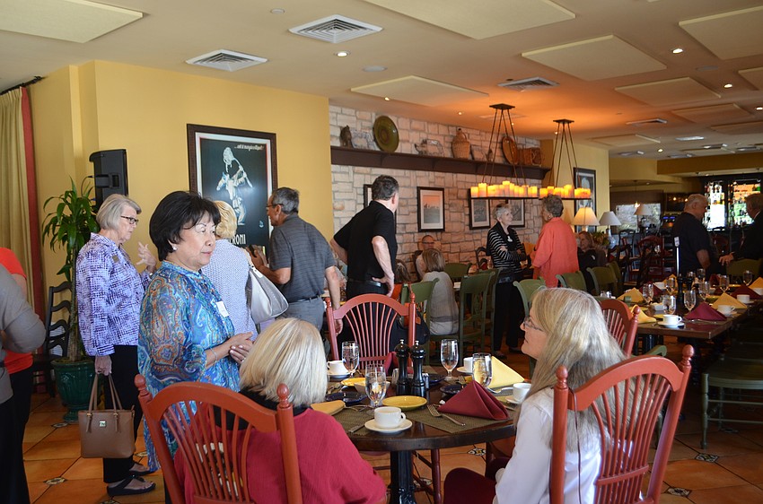 Members mingled before guest speaker, Rob Lorei, a political analyst for WEDU and moderator of “Florida This Week,