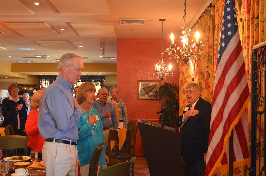 The Longboat Key Democratic Club recites the Pledge of Allegiance before the beginning of its meeting on Nov. 16.