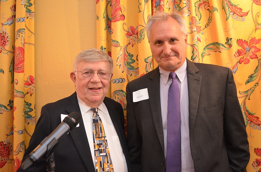 Longboat Key Democratic Club President Murray Blueglass and guest speaker Rob Lorei a political analyst for PBS-Channel 3 and moderator of “Florida This Week.”