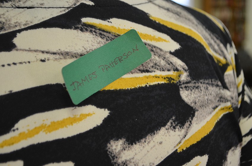 Library volunteers were each given a sticker with an author’s name to wear on their back. During an ice-breaker game, the volunteers asked “yes” or “no” questions to figure out who their author was.