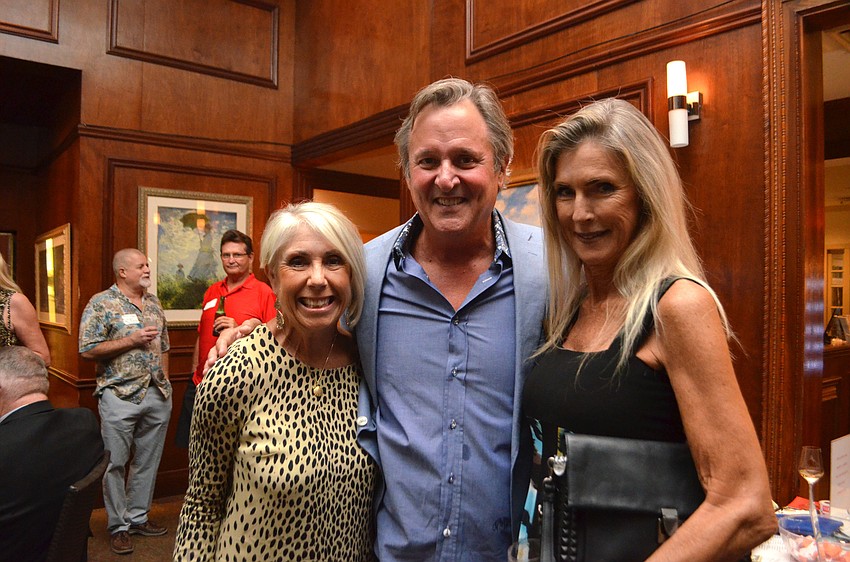 Jane Hunter, chairman-elect Mike Doll and Nikki Edwards