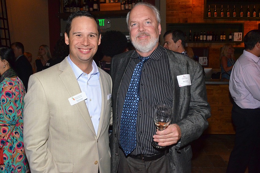 Rick Gomez, board president, with Bob Koski
