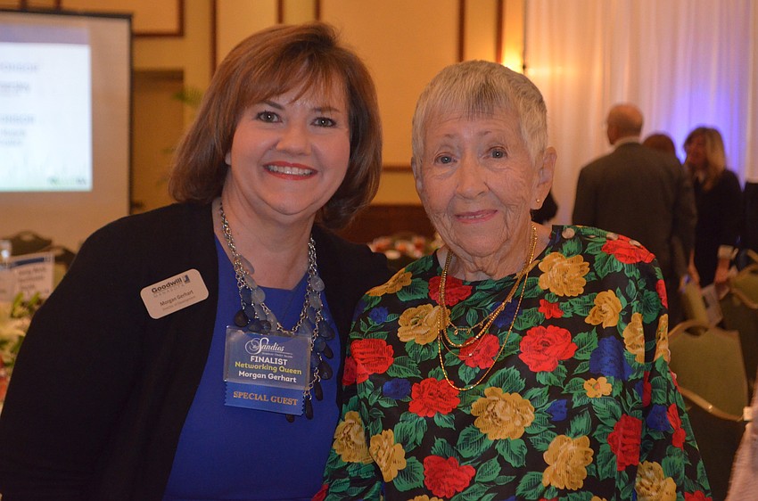 Morgan Gerhart, who works with Goodwill Manasota, and her mother, Marilyn Gerhart, chat before the Sandies.
