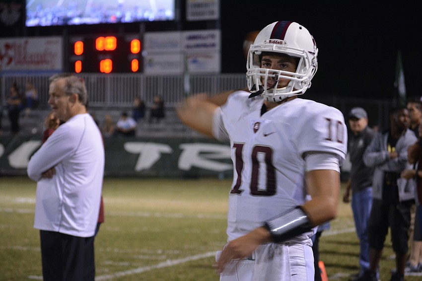 Braden River senior quarterback Louis Colosimo warms up.