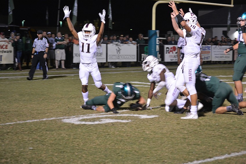Braden River wideout Craivon Koonce and quarterback Louis Colosimo signal for a touchdown.