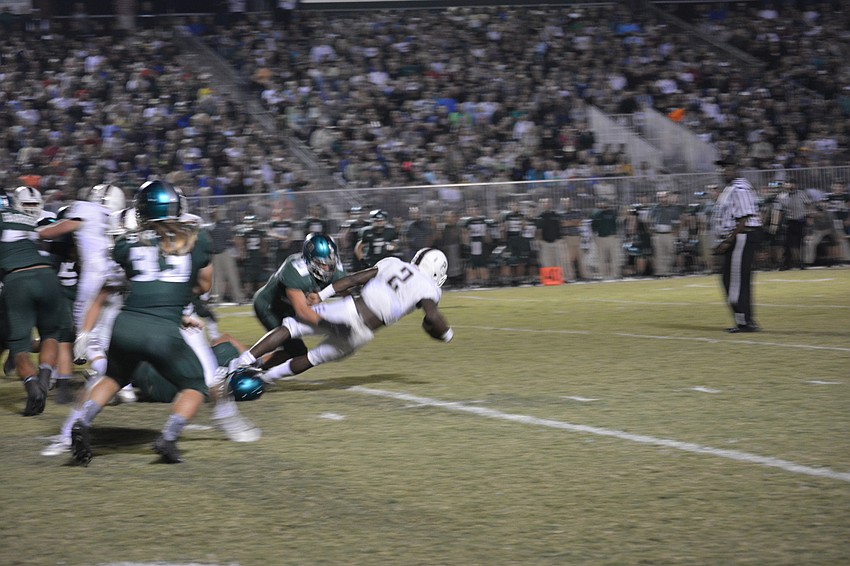 Braden River running back Deshaun Fenwick runs for a first down.