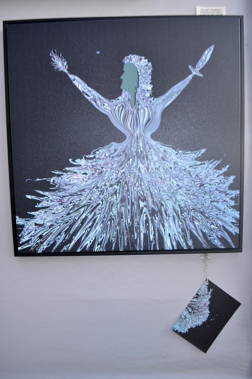 Dacota Maphis used Photoshop to change the original photograph of a tree (shown below) into a dancer (shown above).