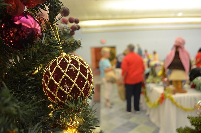 Decorated Christmas trees were on display and for sale at the St. Mary Christmas Bazaar. The women’s guild began planning the event in June.