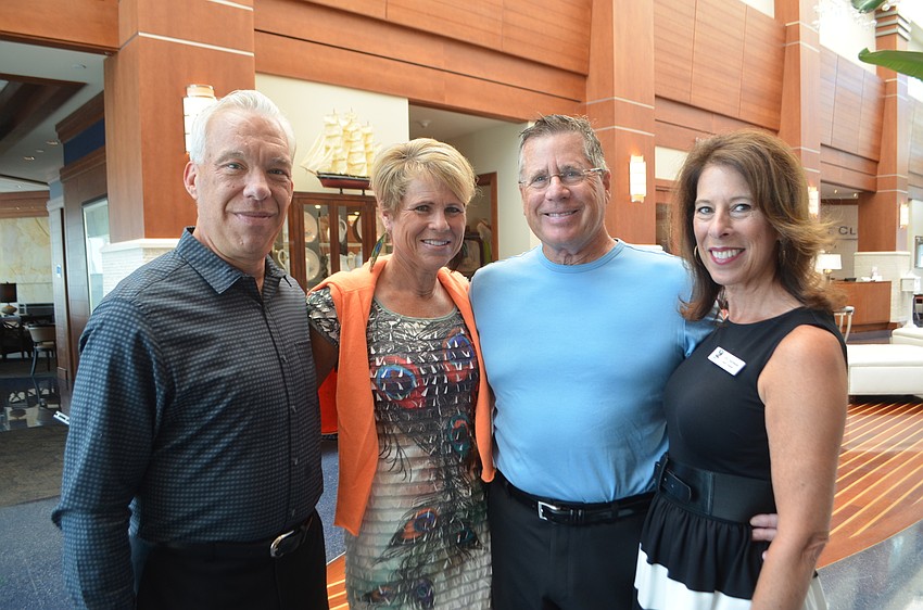 John Hartmann, Beth and Bob Scheible and Lisa Hartmann, a board member for Save our Seabirds