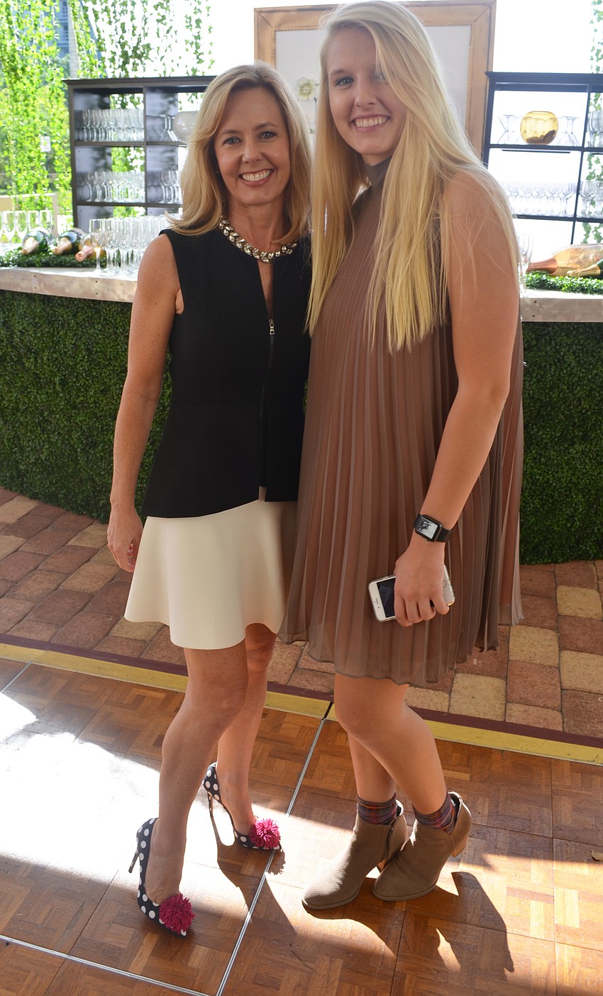 Minta Getzen, event coordinator, with Madeline Cobbler