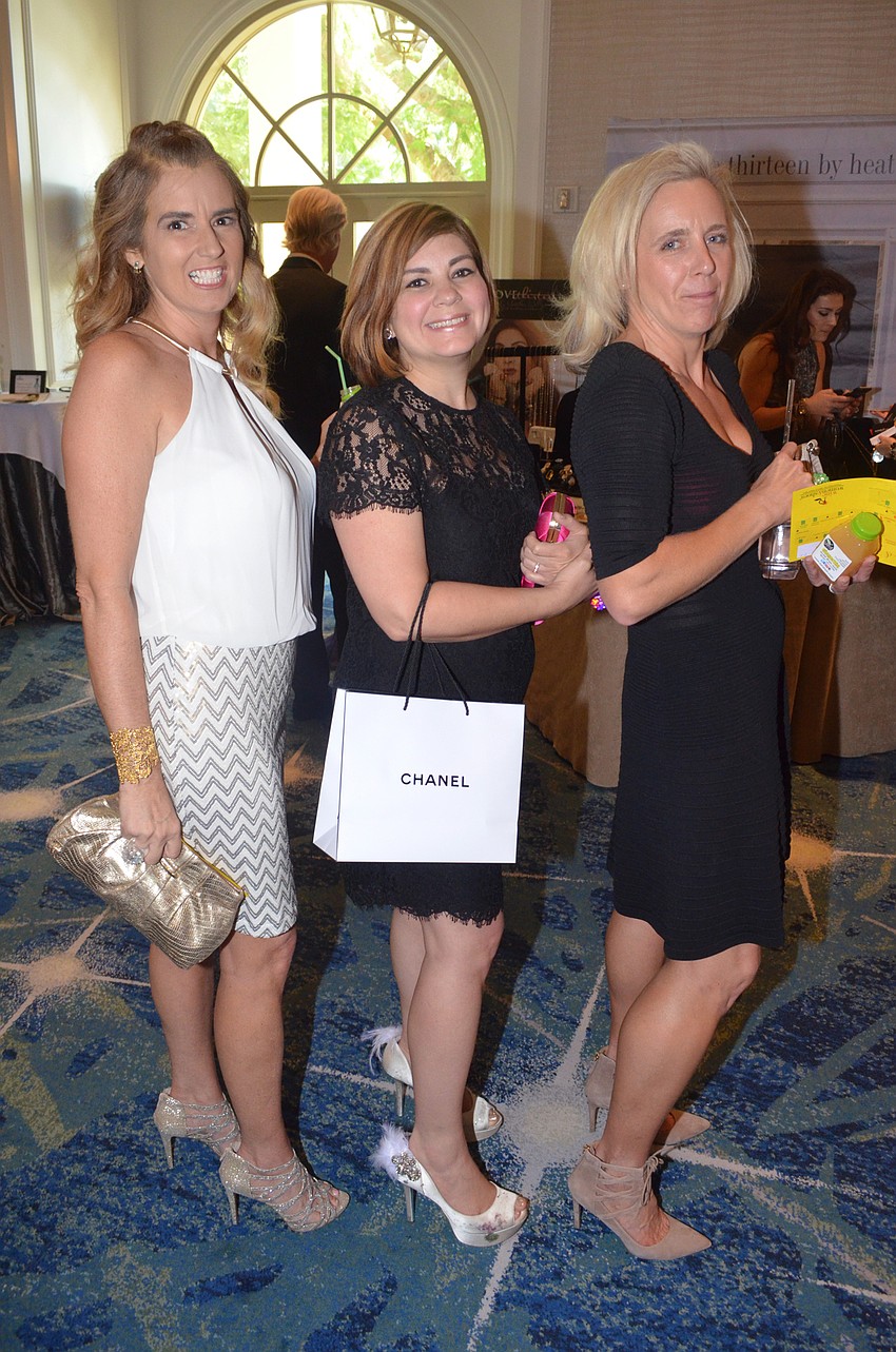 Carol McCloskey, Dr. Myrdalis Diaz-Ramirez and Bailey Lowther