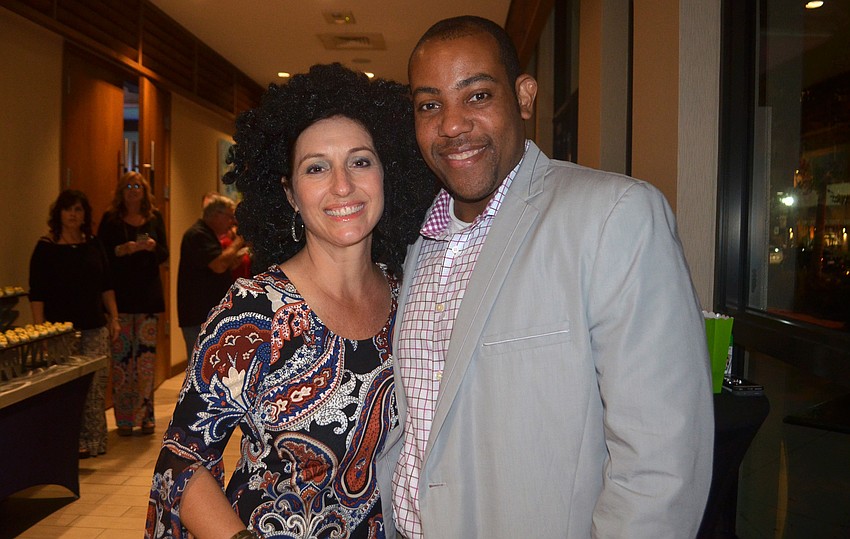 Riverview's Efforts to Assist our Children at Home (REACH) chairwoman Hali Bloom and Riverview High School Principal Paul Burns.