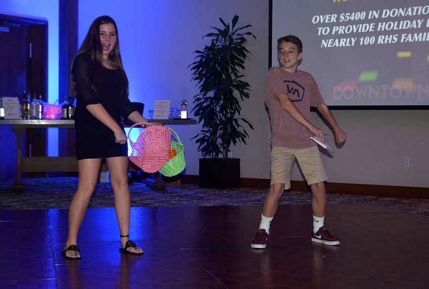 Riverview freshmen Audrianna Twigg and Tanner Russell broke in the dance floor while partygoers began to trickle into the ballroom.