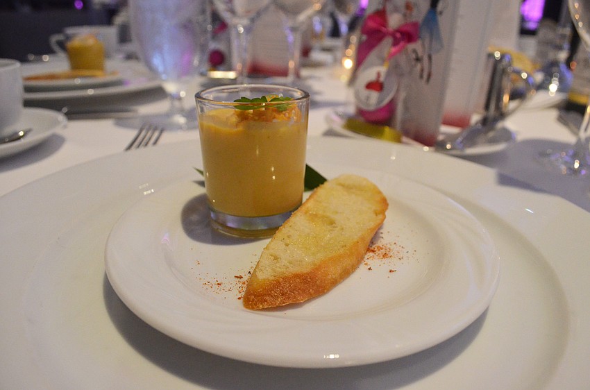 Attendees enjoyed a sweet potato and pear vichyssoise with spiced whipped cream for an amuse-brioche before the main course.