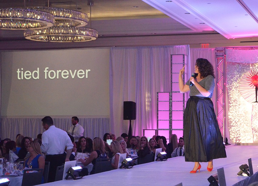 Actress Jessica Garret performs a spoken word piece about a story of survival made possible by Forty Carrots Family Center.