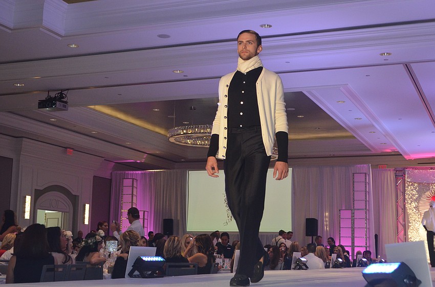 Models show off designer Zang Toi’s latest collection.