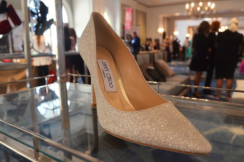 Various pairs of elegant Jimmy Choo shoes were on sale at the Saks Fifth Avenue vendor area.