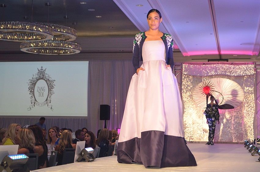 Models show off designer Zang Toi’s latest collection.