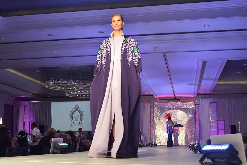 Models show off designer Zang Toi’s latest collection.