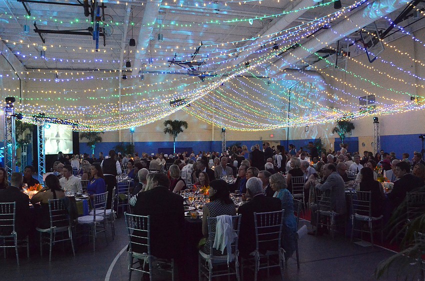 The gymnasium was transformed into a shimmering sea of greens and blues.