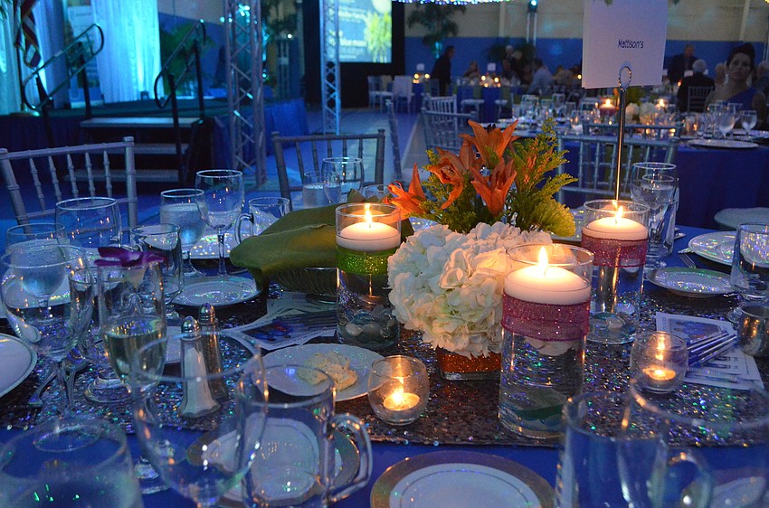 The gymnasium was transformed into a shimmering sea of greens and blues.