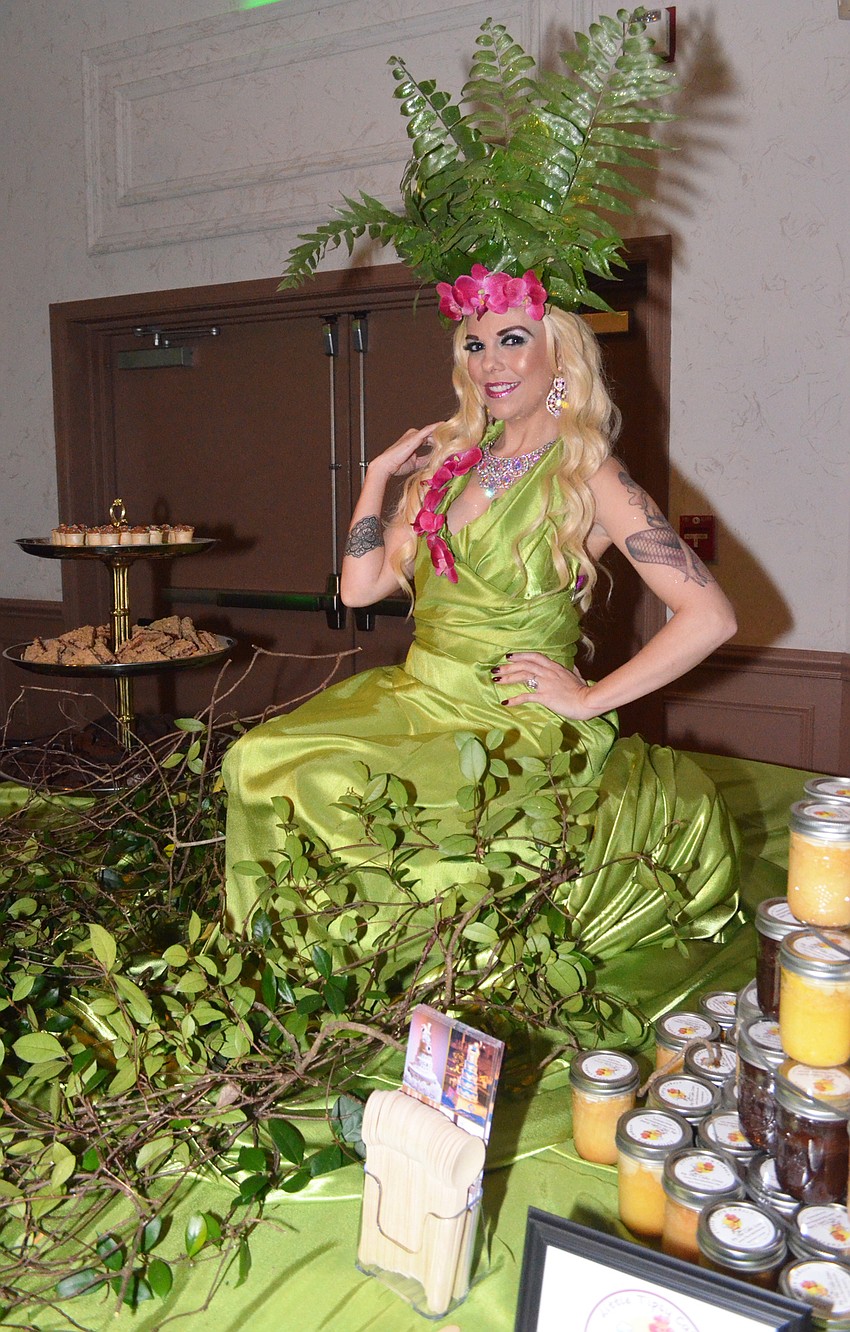 Virginia Hughes models as an enchanted forest figure on the dessert table.