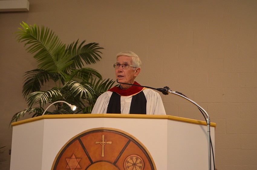 Rev. David Danner of All Angels by the Sea Episcopal Church performs the benediction during the Thanksgiving Interfaith Service on Nov. 22.