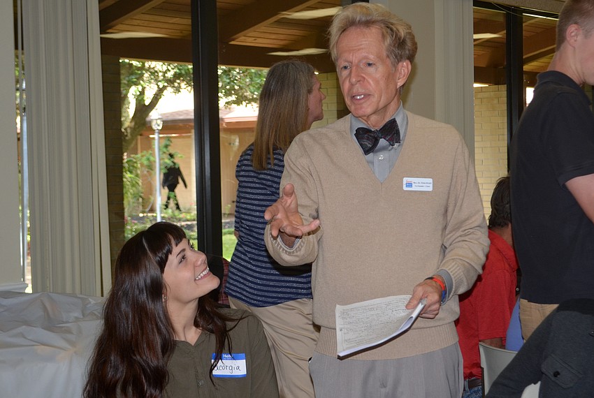 Sarasota Ministerial Association chairman Tom Pfaff greets attendees.