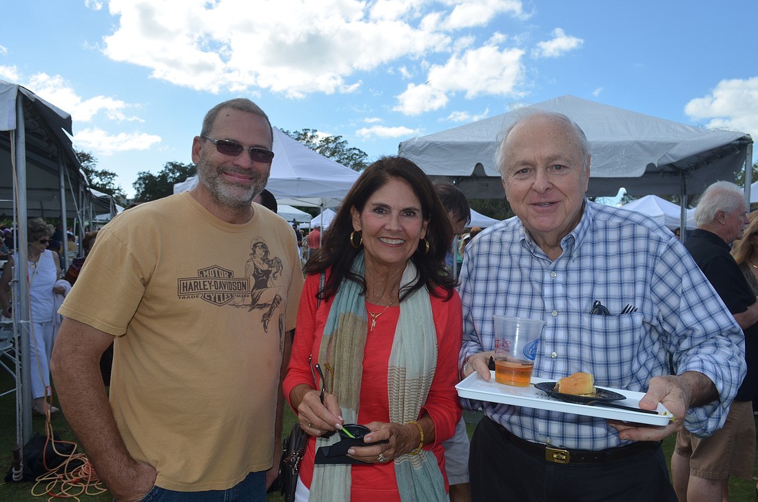 Jeff Laughlin, Mary Lou Johnson and Frank Cona at last year's lawn party.