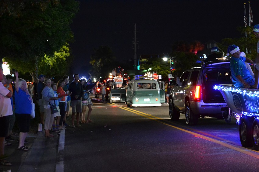 Floats for local businesses participated in the  Light Up The Village parade Saturday, Nov. 26.