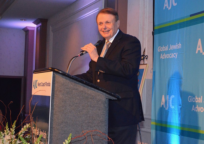 Dr. Larry Thompson, past Civic Achievement Award winner, tells the story of how he met  Walsh.