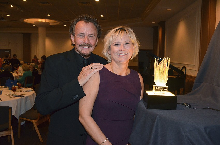 Honorees Rebecca and Richard Hopkins with their Luminaire Award