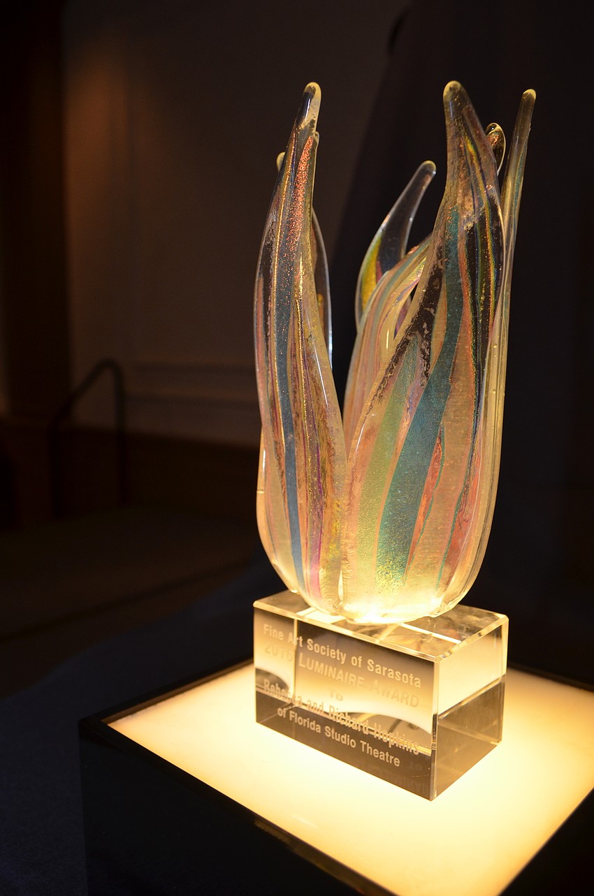 The uniquely designed Luminaire Award awaited its recipients atop an illuminated stand.