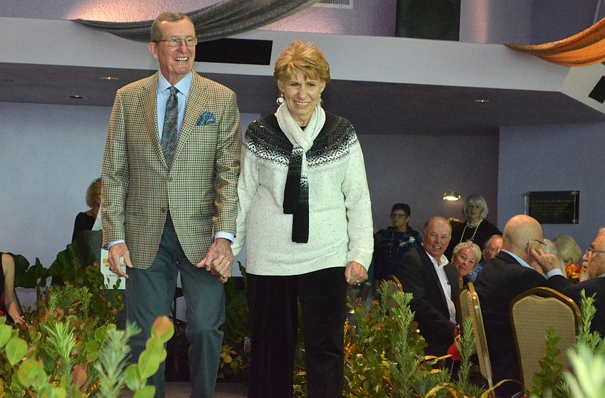 Speaker Dr. John Moore with Model Carol Williams