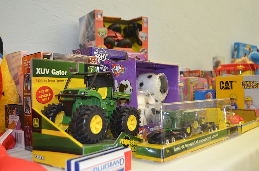 Attendees were asked to bring an unwrapped toy to be donated to Catholic Charities.