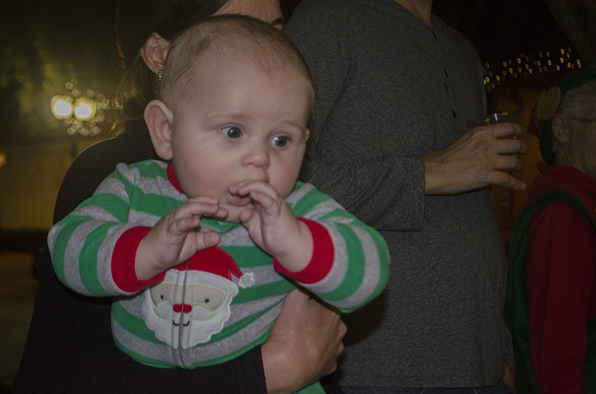 Andrew Meese wears a Christmas jumper during the downtown tree lighting.